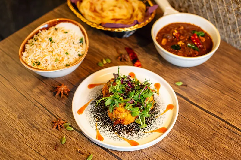A spread of dishes and drinks at Mattancherry